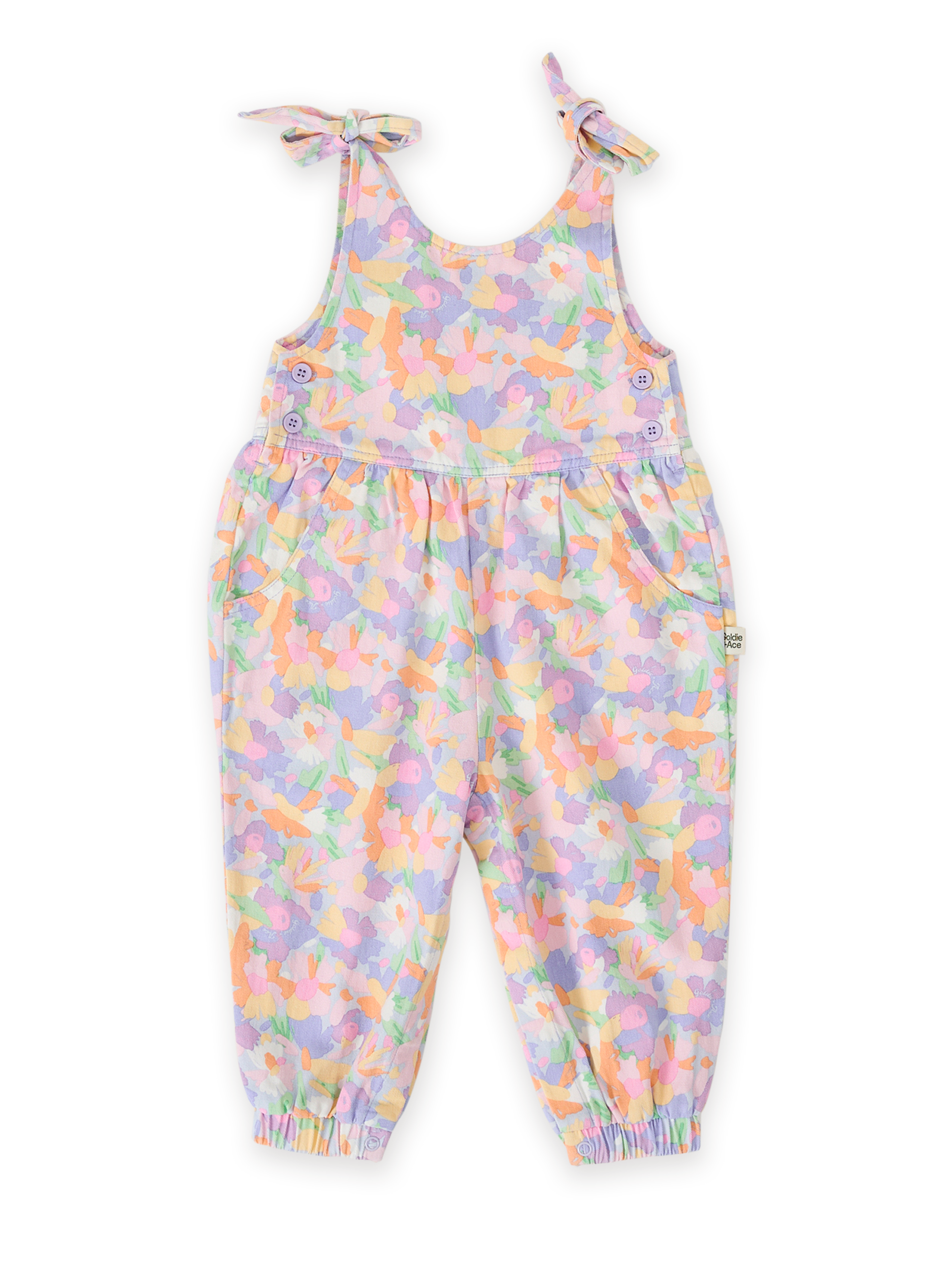 The Goldie + Ace Pastel Bouquet Tiffany Tie Overalls in Lilac Multi pictured on a transparent background. The material is 100% cotton. It is a overall made for babies, toddlers and kids.
