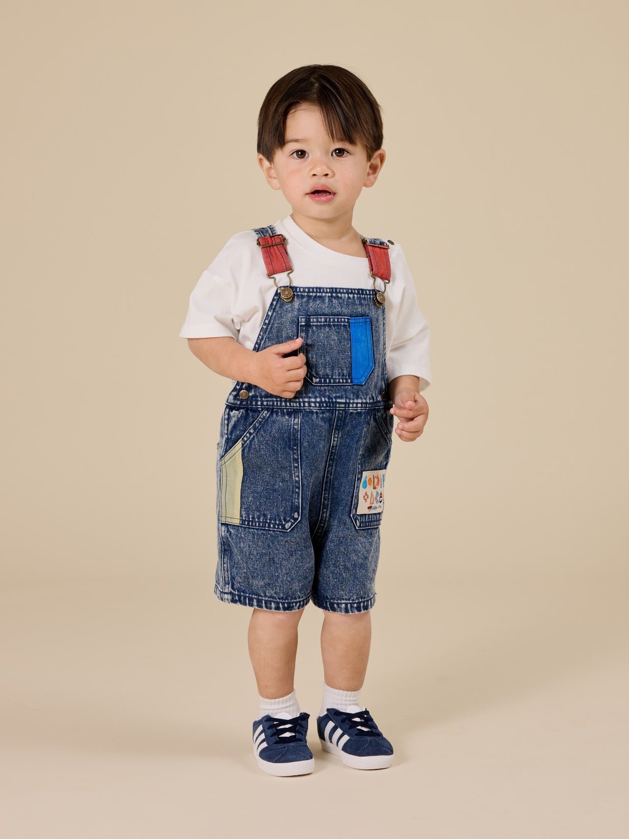 The Goldie + Ace G'Day From The Bay T-Shirt in White pictured on a transparent background. The material is 100% cotton. It is a top made for babies, toddlers and kids.
