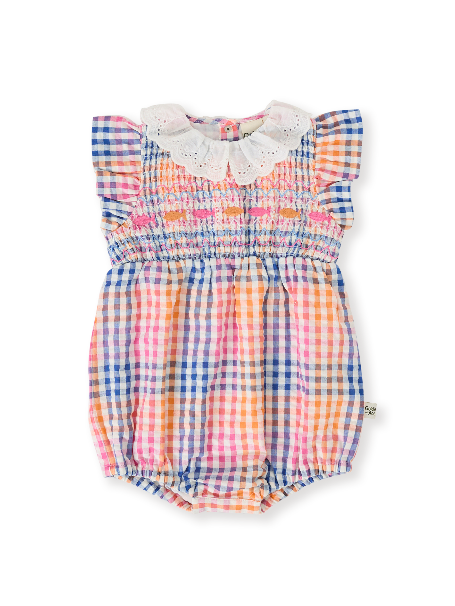 The Goldie + Ace Rainbow Gingham Lani Smocked Romper in Multi pictured on a transparent background. The material is cotton with cotton lining. It is a romper made for babies, toddlers and kids.