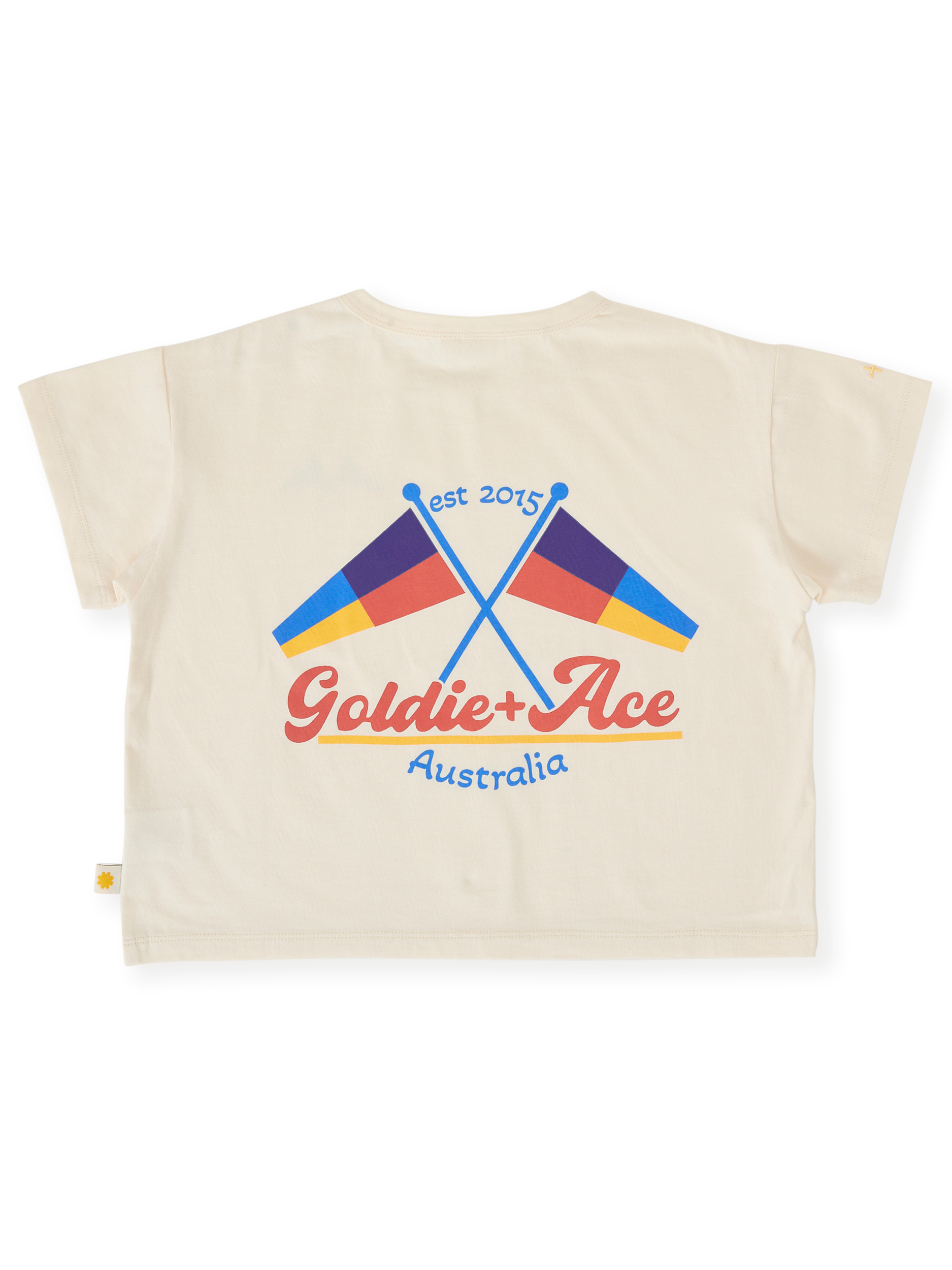 The Goldie + Ace Nautical Flag Oversized T-Shirt in Cream pictured on a transparent background. The material is 100% cotton. It is a top made for babies, toddlers and kids.