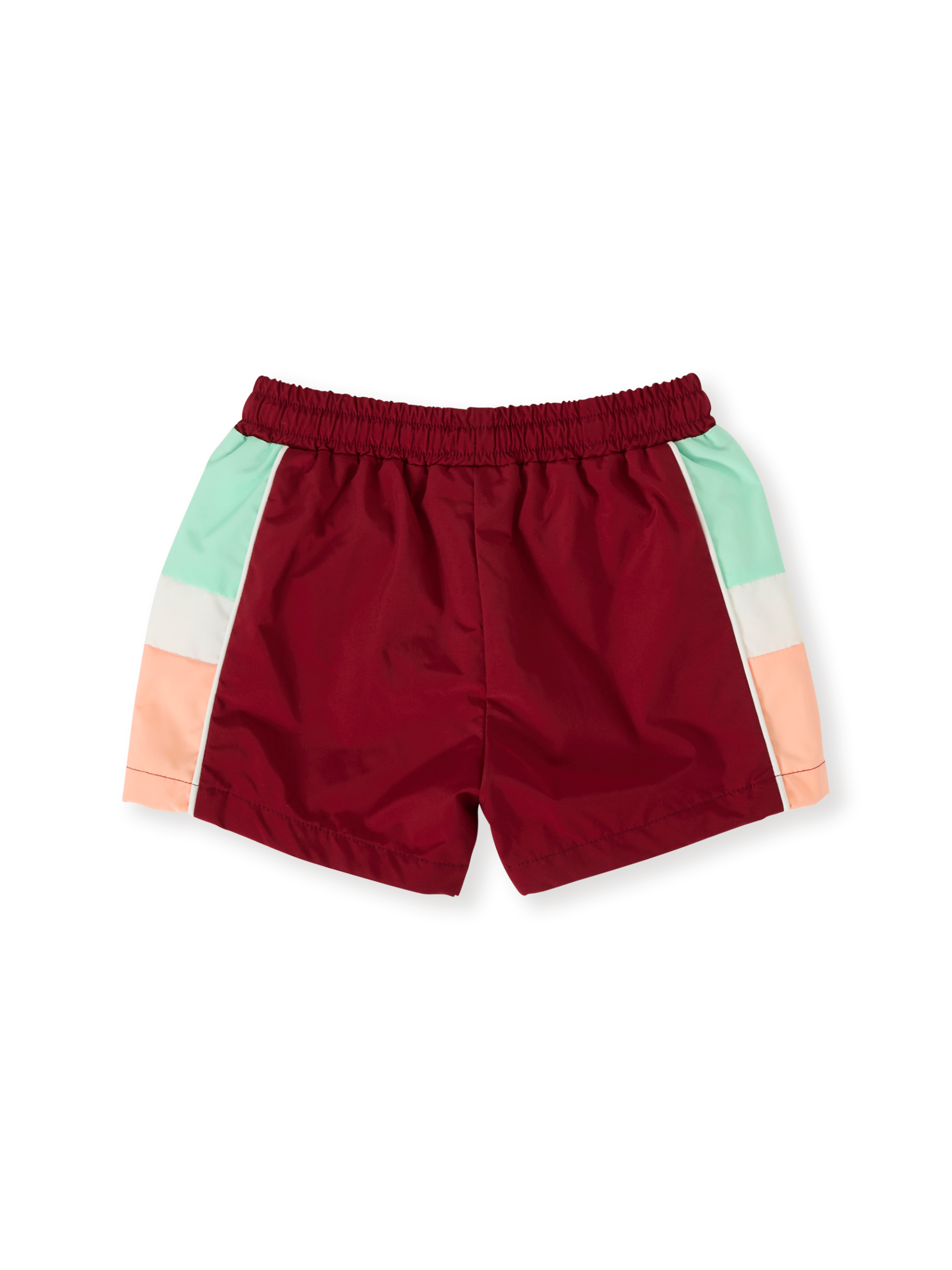 The Goldie + Ace Retro Sporty Shorts in Brick/Peapod pictured on a transparent background. The material is poly with cotton lining. It is a bottom made for babies, toddlers and kids.