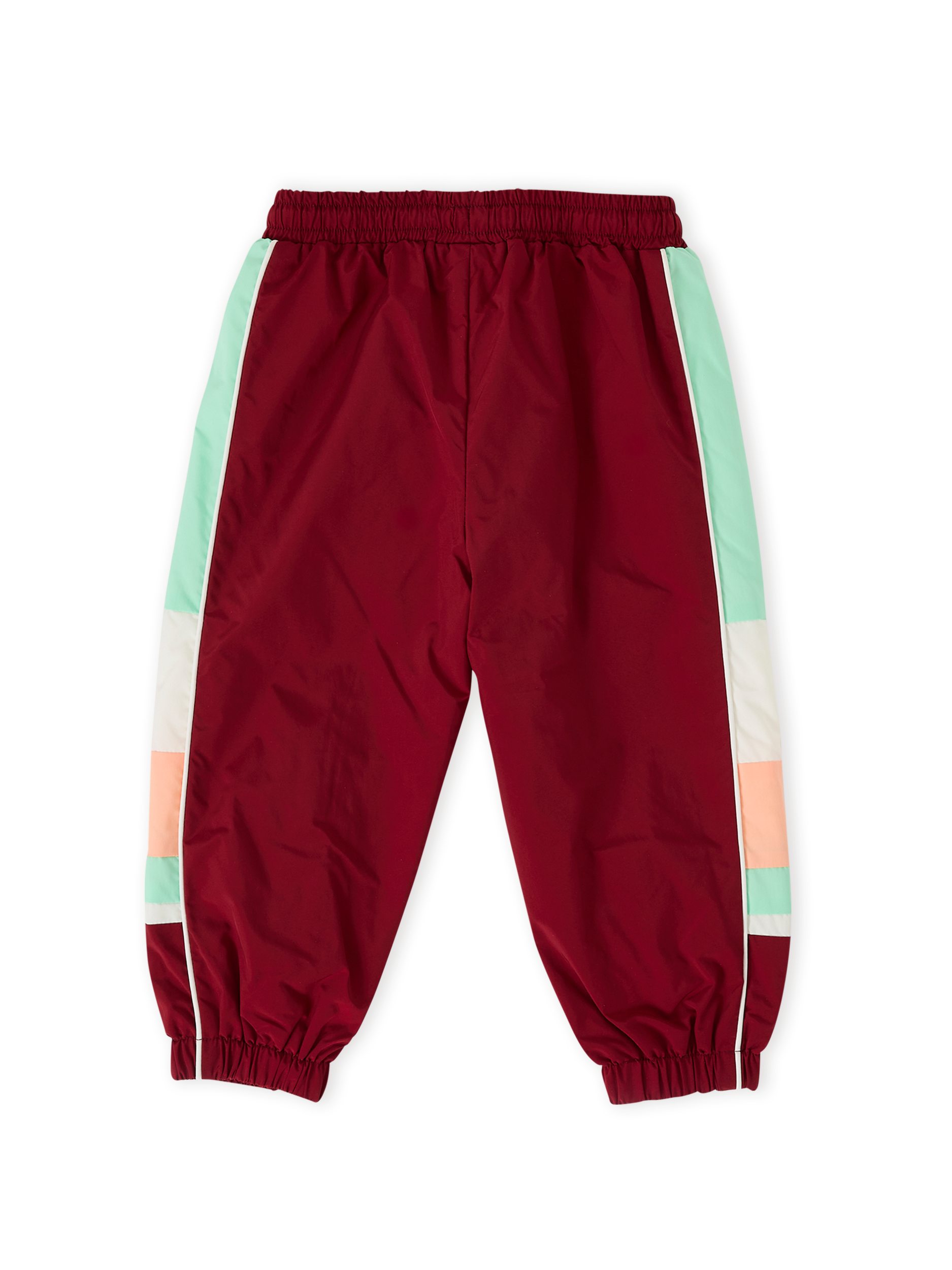 The Goldie + Ace Retro Sporty Pants in Brick/Peapod pictured on a transparent background. The material is poly with cotton lining. It is a bottom made for babies, toddlers and kids.