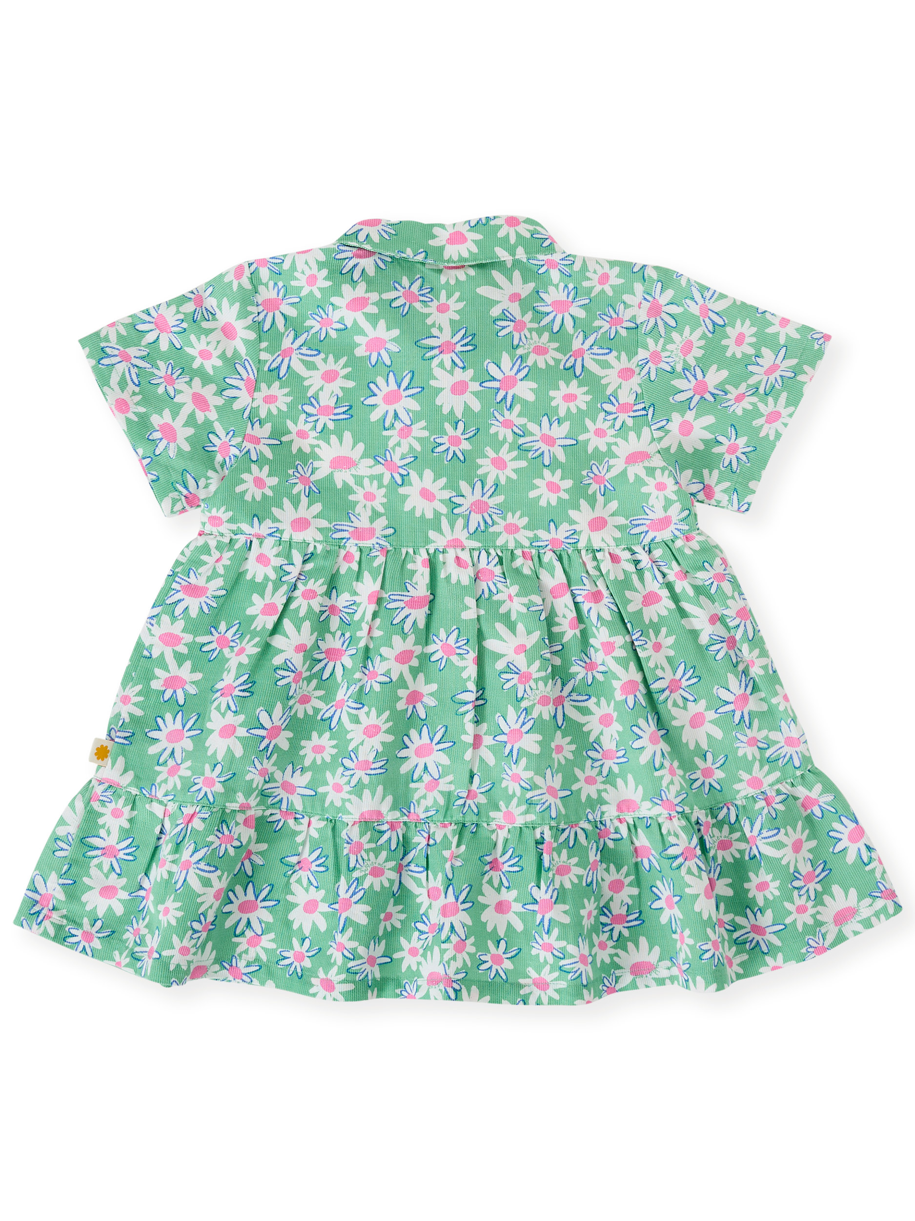 The Goldie + Ace Daisy Patch Monica Dress in Moss pictured on a transparent background. The material is breathable cotton-linen blend. It is a dress made for babies, toddlers and kids.