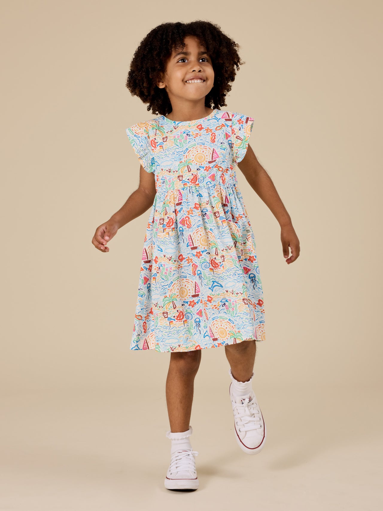 The Goldie + Ace Summer Bay Lyla Dress in Multi pictured on a transparent background. The material is linen blend. It is a dress made for babies, toddlers and kids.