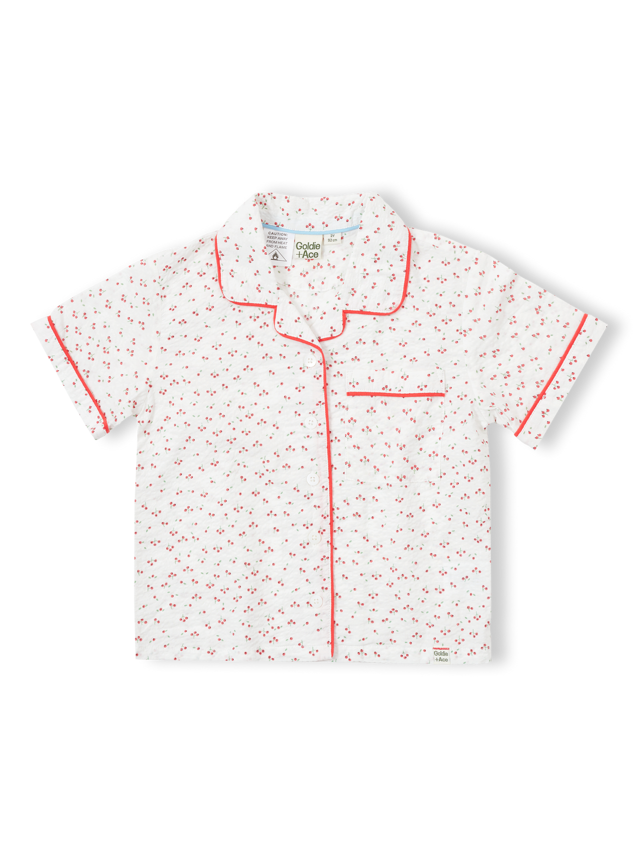 Children's pyjama set with cherry print on seersucker cotton, and a matching drawstring bag