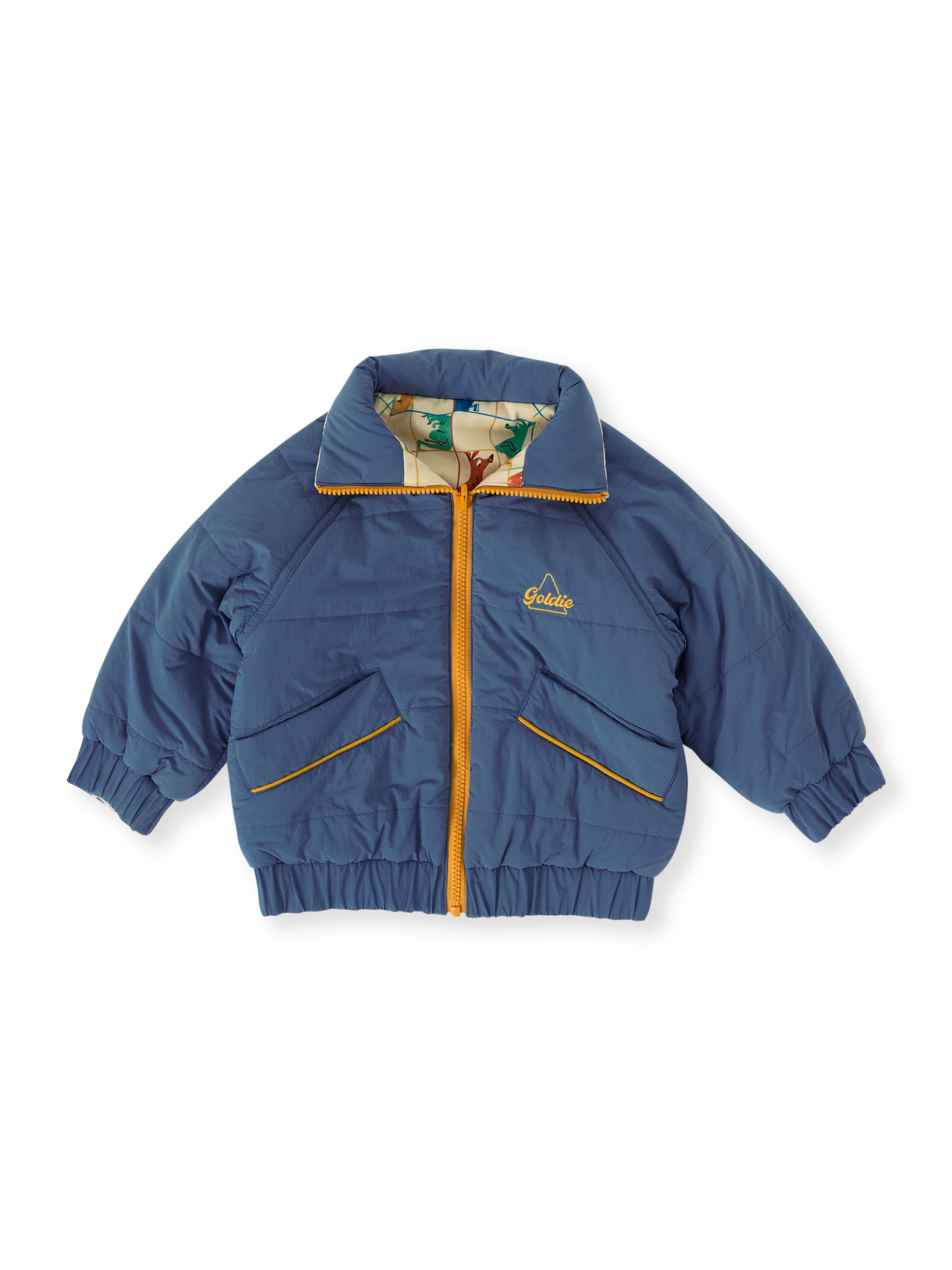 The Goldie + Ace Hopscotch Reversible Puffer Jacket in Lake/Vanilla pictured on a transparent background. The material is poly with cotton lining. It is a jacket made for babies, toddlers and kids.