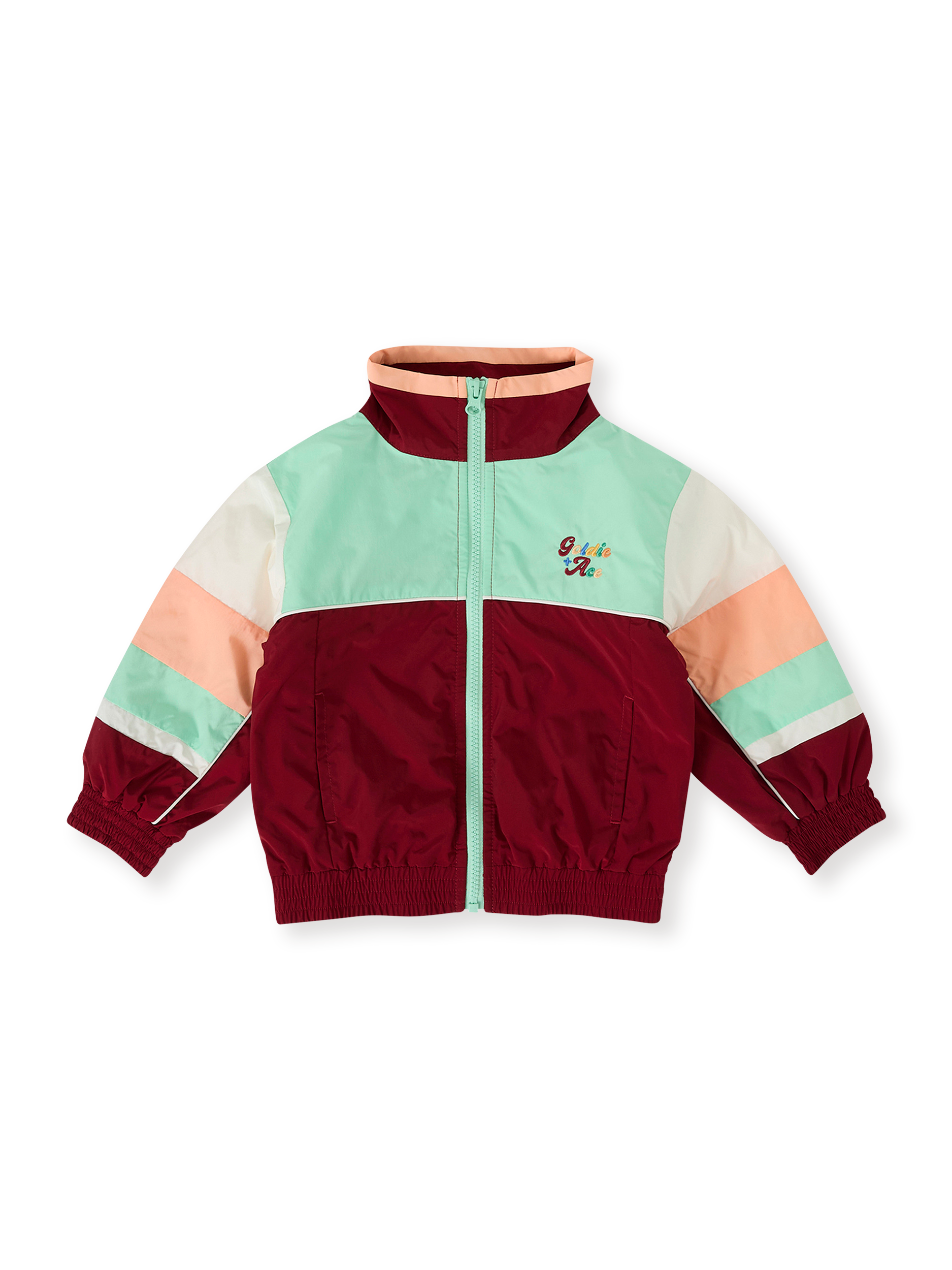 The Goldie + Ace Fun Run Retro Spray Jacket in Brick/Peapod pictured on a transparent background. The material is poly with cotton lining. It is a jacket made for babies, toddlers and kids.