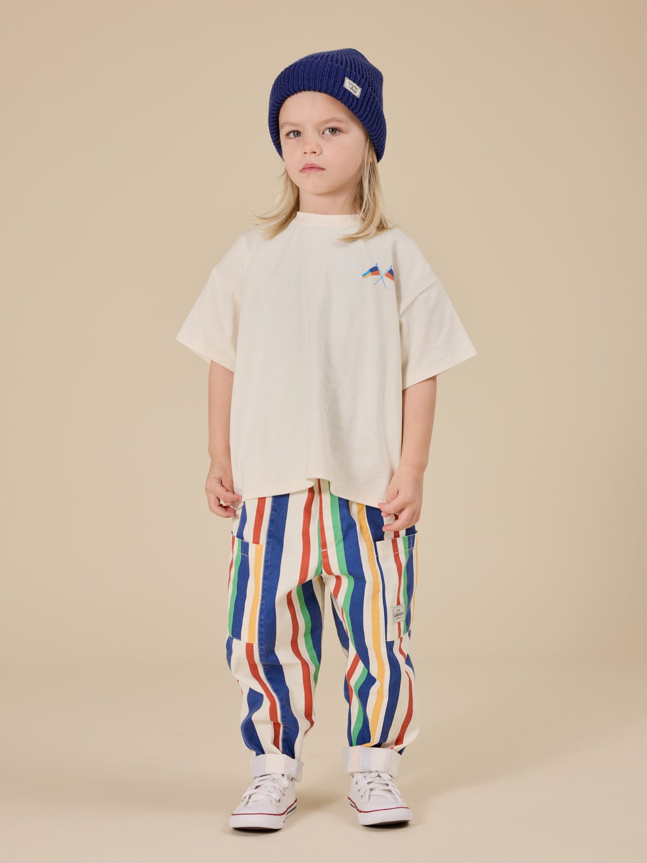 The Goldie + Ace 90's Bold Stripe Kit Denim Pocket Pant in Primary pictured on a transparent background. The material is 100% cotton. It is a bottom made for babies, toddlers and kids.