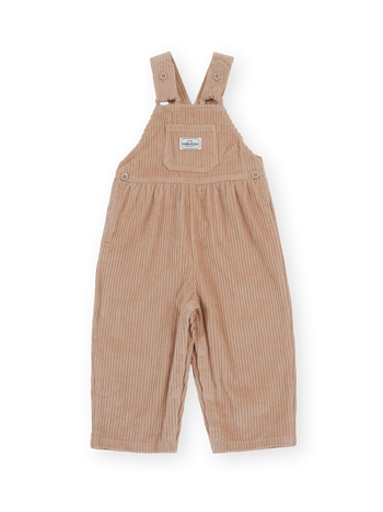The Goldie + Ace Sammy Corduroy Overall in Tan pictured on a transparent background. The material is 100% cotton. It is a overall made for babies, toddlers and kids.