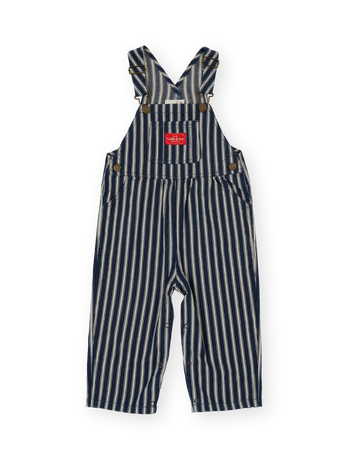 The Goldie + Ace Railroad Stripe Austin Overalls in Indigo pictured on a transparent background. The material is 65% polyester 35% cotton. It is a overall made for babies, toddlers and kids.