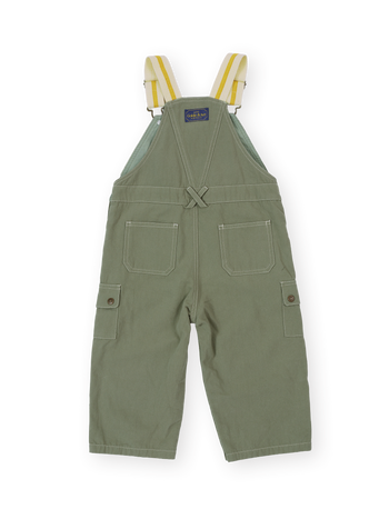 The Goldie + Ace Carpenter Utility Austin Overalls in Sage pictured on a transparent background. The material is 100% cotton. It is a overall made for babies, toddlers and kids.