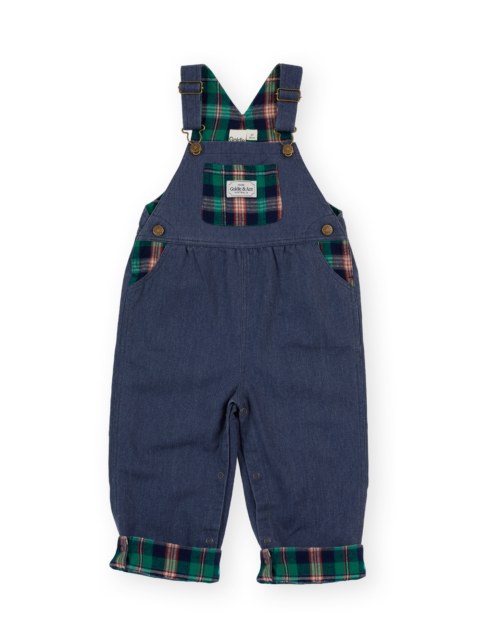 The Goldie + Ace Austin Green Check Overalls in Navy & Green Check pictured on a transparent background. The material is 100% cotton. It is a overall made for babies, toddlers and kids.