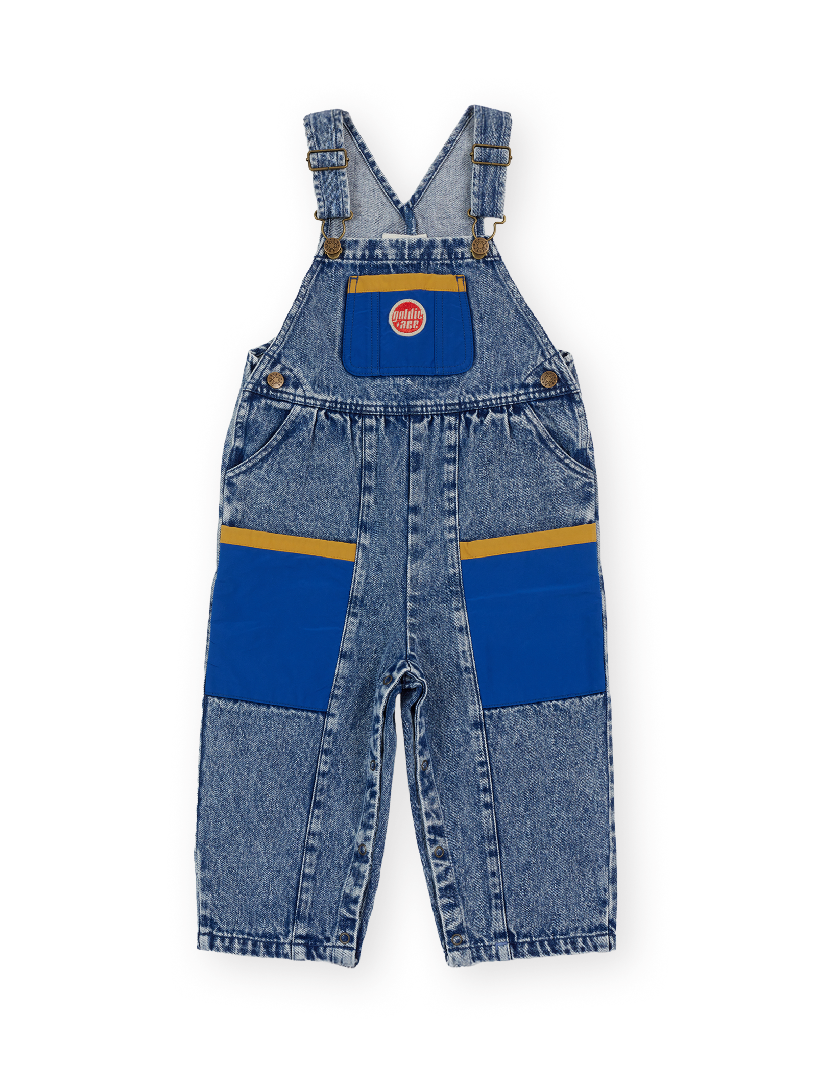 The Goldie + Ace Austin Colour Block Vintage Denim Overalls in Dark Denim & Multi pictured on a transparent background. The material is 100% cotton. It is a overall made for babies, toddlers and kids.
