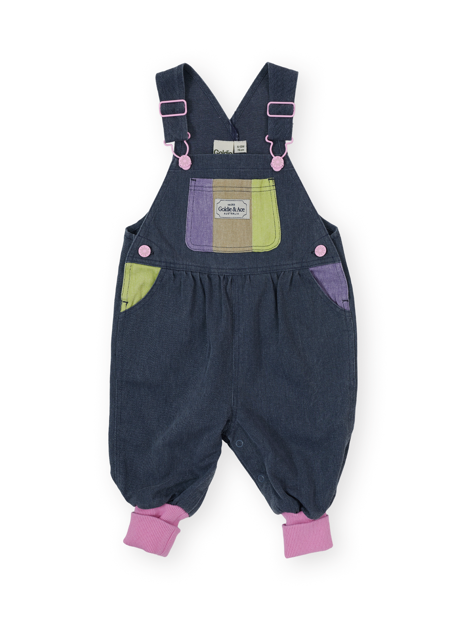 The Goldie + Ace Colour Pop Baby Austin Overalls in Purple & Green pictured on a transparent background. The material is 100% cotton. It is a overall made for babies, toddlers and kids.