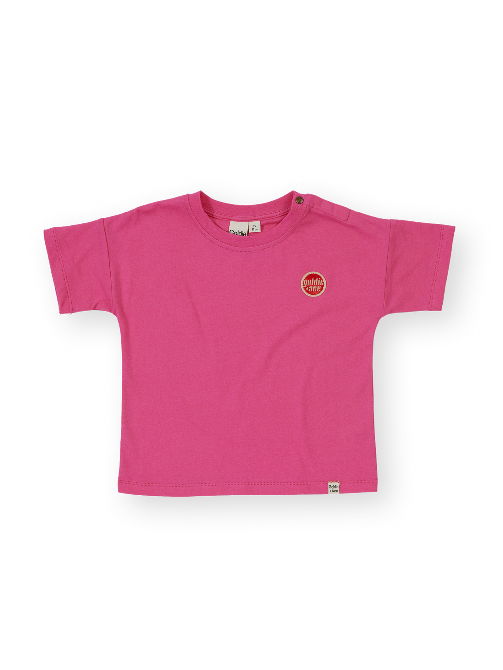 The Goldie + Ace Essential Logo T-Shirt in Pink pictured on a transparent background. The material is 100% cotton. It is a t-shirt made for babies, toddlers and kids.