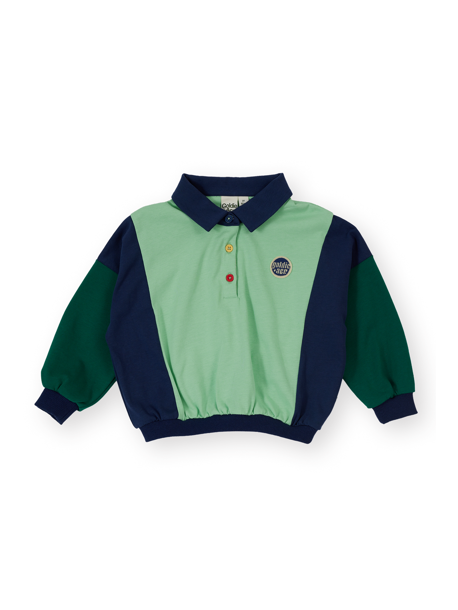 The Goldie + Ace Panelled Relaxed Rugby Sweat Top in Navy & Green pictured on a transparent background. The material is 100% cotton. It is a t-shirt made for babies, toddlers and kids.