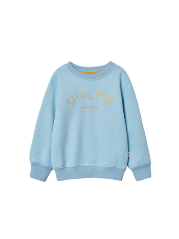 The Goldie + Ace Goldie Crew Embroidered Sweater Light Blue in Blue pictured on a transparent background. The material is 100% cotton. It is a sweater made for babies, toddlers and kids.