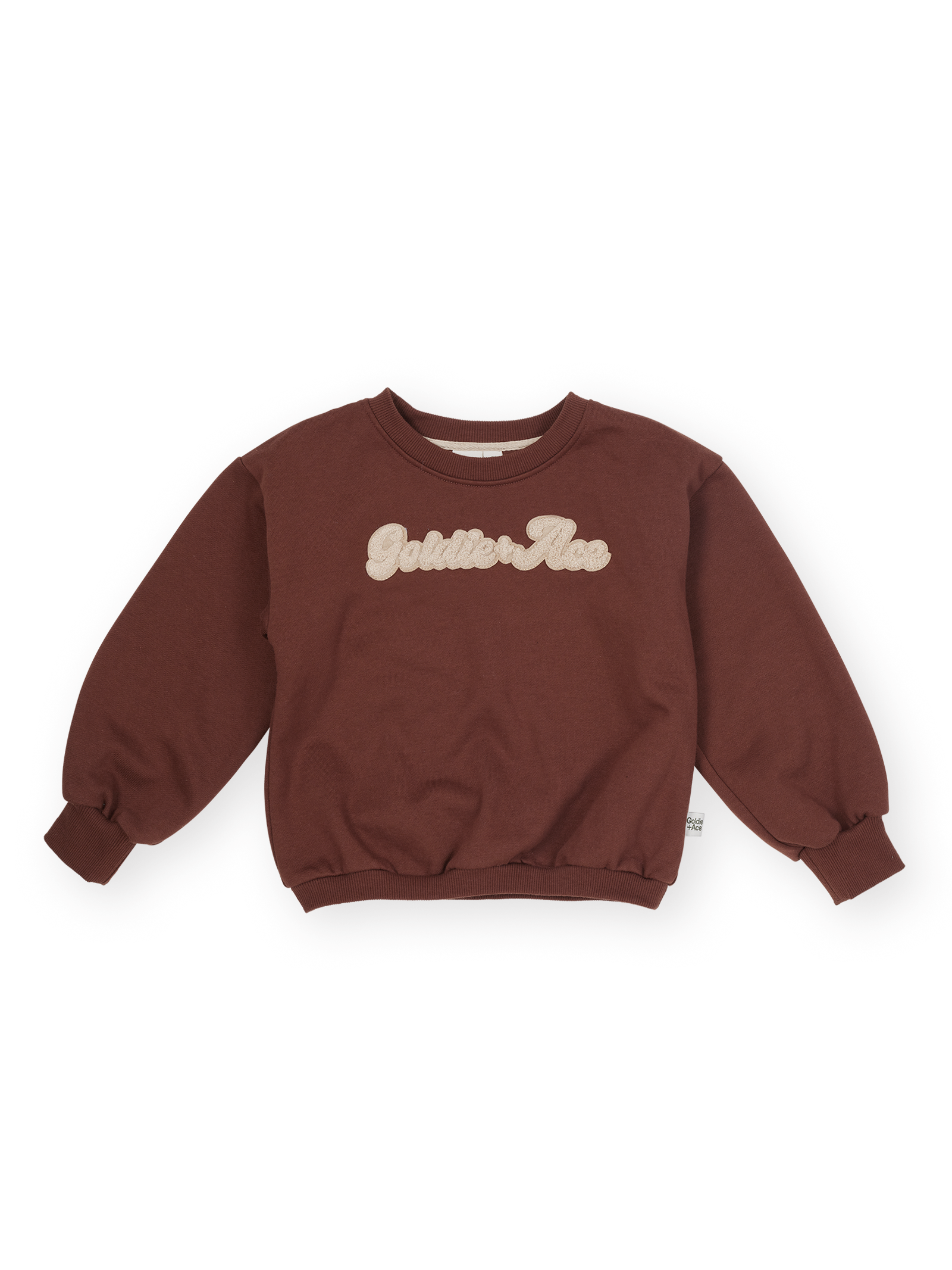 The Goldie + Ace Comfy Embroidered Sweater in Chestnut pictured on a transparent background. The material is 100% cotton. It is a sweater made for babies, toddlers and kids.