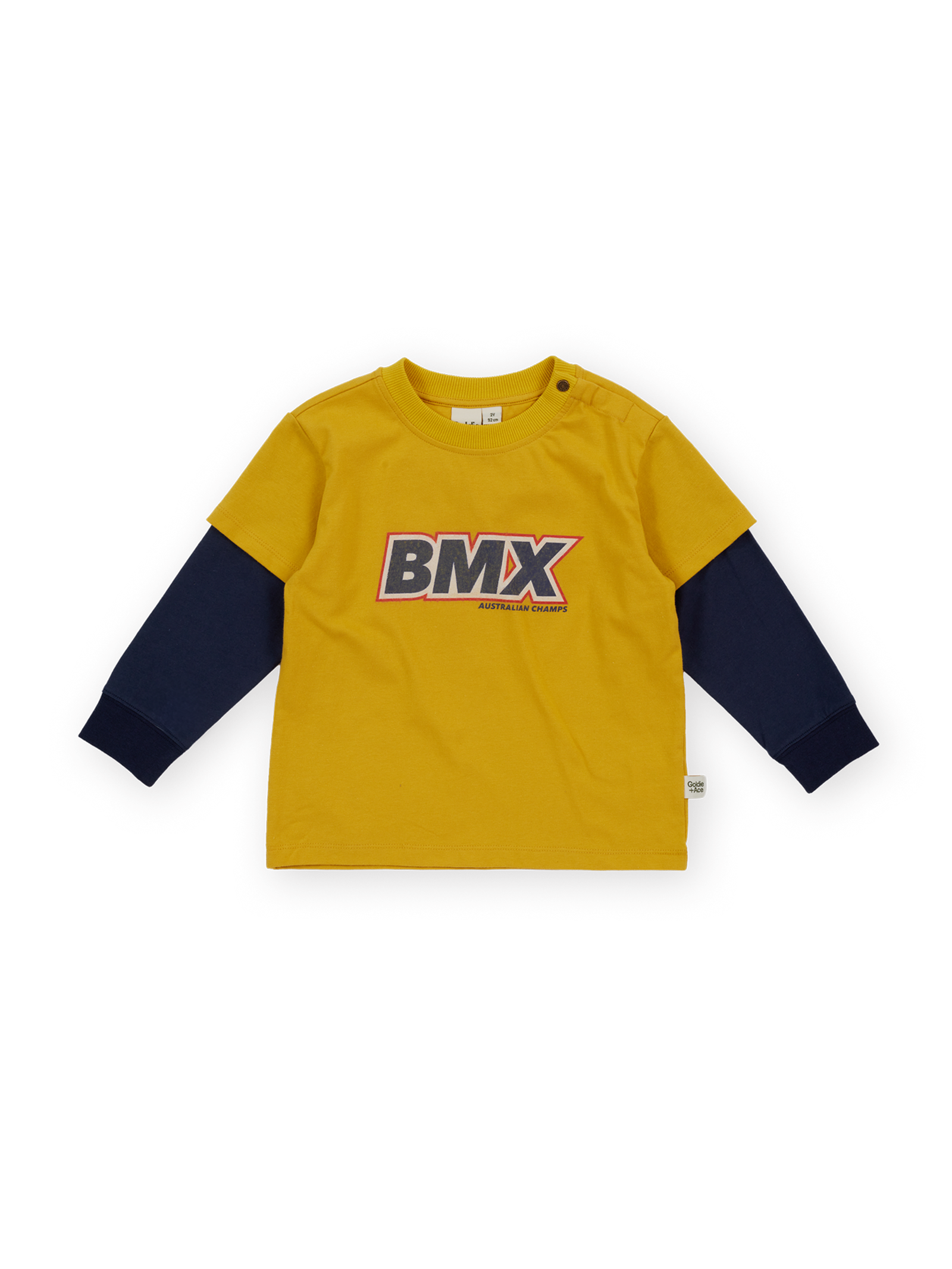 The Goldie + Ace Bmx Layered Longsleeve T-Shirt in Mustard pictured on a transparent background. The material is 100% cotton. It is a t-shirt made for babies, toddlers and kids.