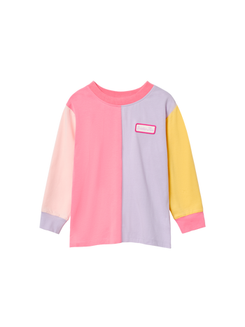 The Goldie + Ace Splice Colour Block Long Sleeve Top Sunset in Pink/Yellow/Purple pictured on a transparent background. The material is 95% cotton, 5% elastane. It is a t-shirt made for babies, toddlers and kids.