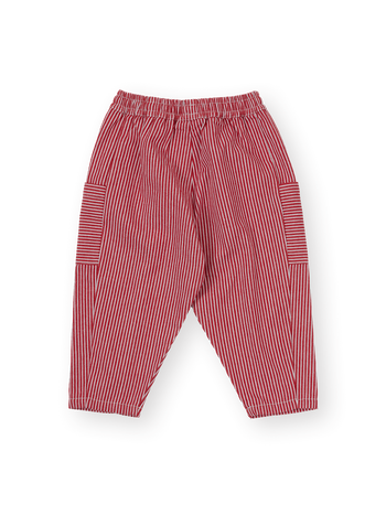 The Goldie + Ace Twist Stripe Kit Pocket Pant in Red pictured on a transparent background. The material is 55% polyester 45% cotton. It is a pant made for babies, toddlers and kids.