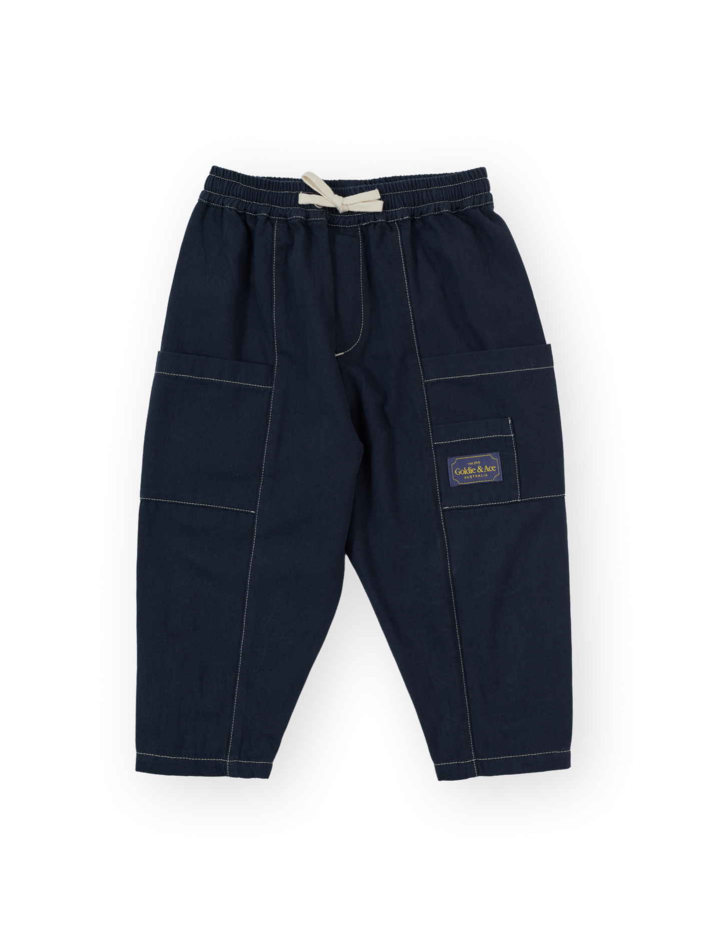 The Goldie + Ace Carpenter Utility Kit Pocket Pant in Navy pictured on a transparent background. The material is 100% cotton. It is a pant made for babies, toddlers and kids.