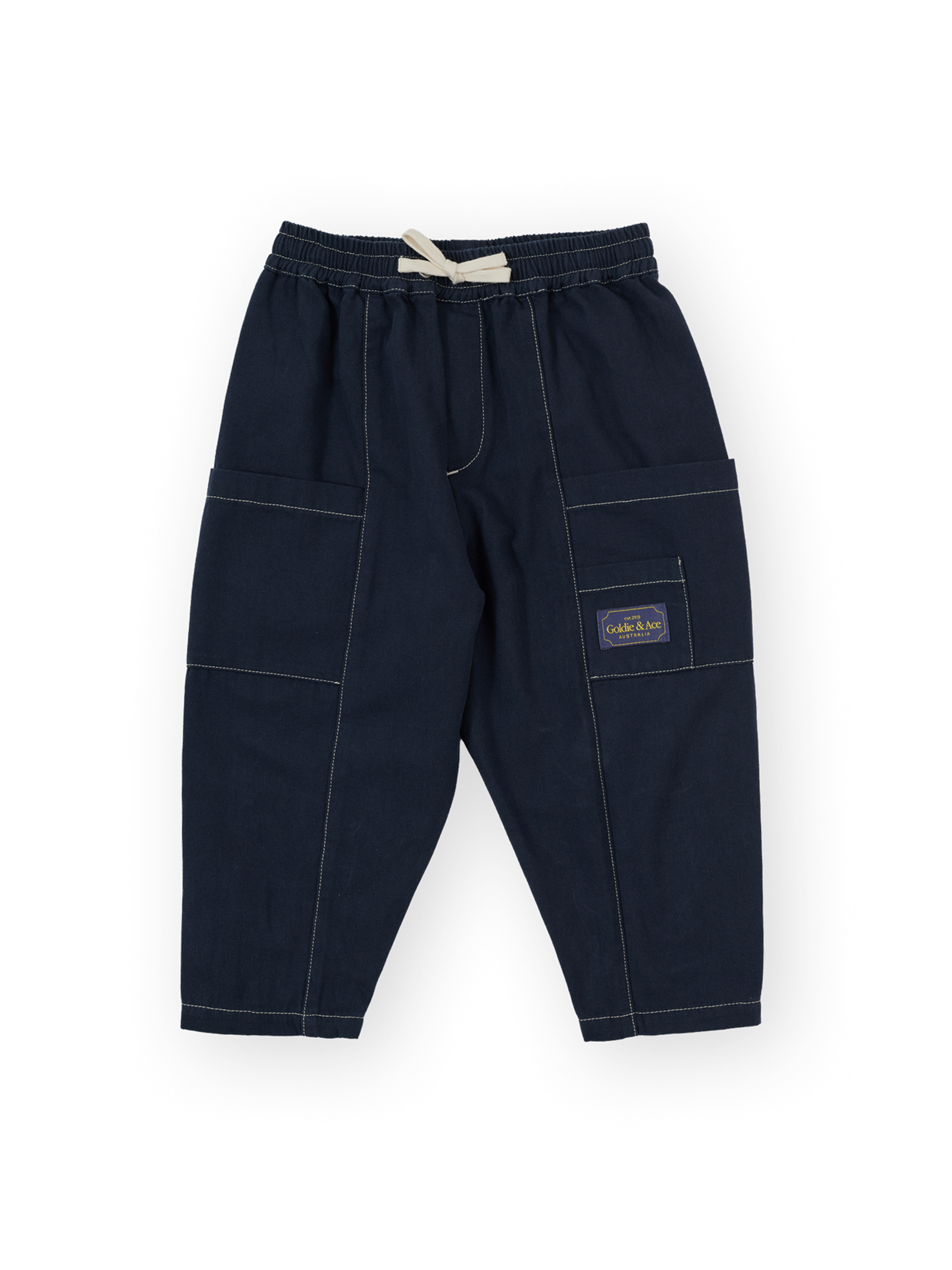 The Goldie + Ace Carpenter Utility Kit Pocket Pant in Navy pictured on a transparent background. The material is 100% cotton. It is a pant made for babies, toddlers and kids.