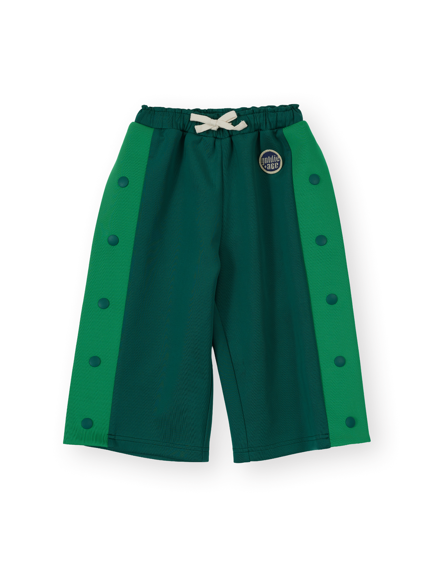 The Goldie + Ace Logo Track Snap Pants in Green pictured on a transparent background. The material is 100% polyester. It is a sweatpant made for babies, toddlers and kids.
