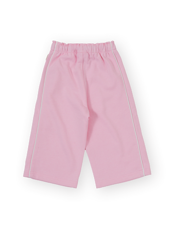 The Goldie + Ace Wide Leg Piped Sweatpants in Pink pictured on a transparent background. The material is 100% cotton. It is a sweatpant made for babies, toddlers and kids.