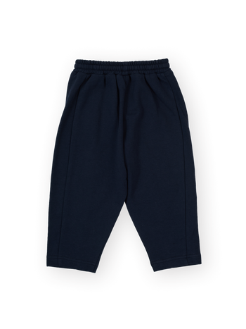The Goldie + Ace Diamond Patch Sweat Pant in Navy pictured on a transparent background. The material is 100% cotton. It is a sweatpant made for babies, toddlers and kids.