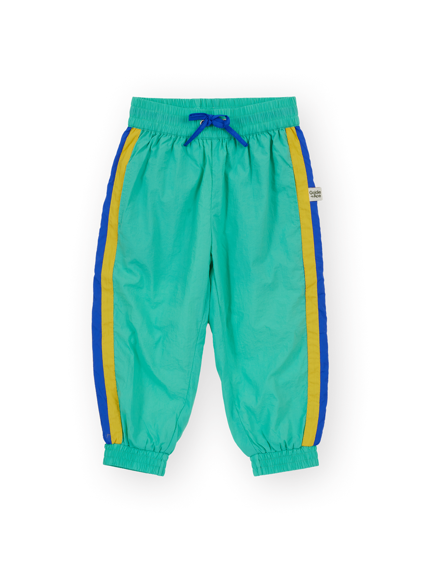 The Goldie + Ace Retro Lightweight Sporty Pants in Blue &amp; Green pictured on a transparent background. The material is 100% polyester, filling: 100% cotton. It is a pant made for babies, toddlers and kids.