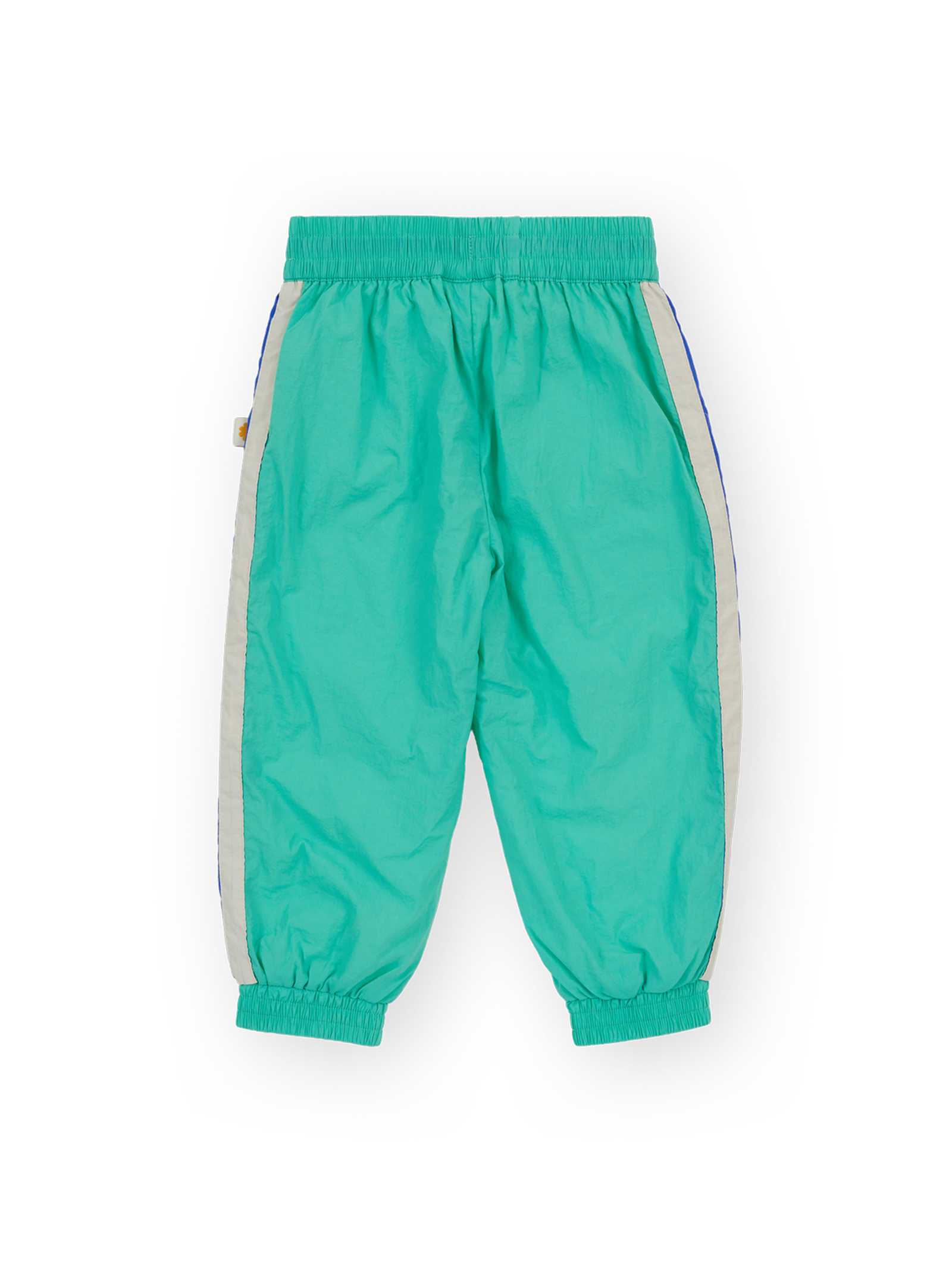 The Goldie + Ace Retro Lightweight Sporty Pants in Blue & Green pictured on a transparent background. The material is 100% polyester, filling: 100% cotton. It is a pant made for babies, toddlers and kids.