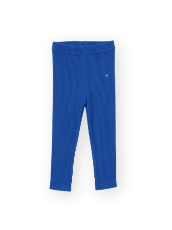The Goldie + Ace Bowie Rib Legging in Classic Blue pictured on a transparent background. The material is 95% cotton 5% spandex. It is a pant made for babies, toddlers and kids.