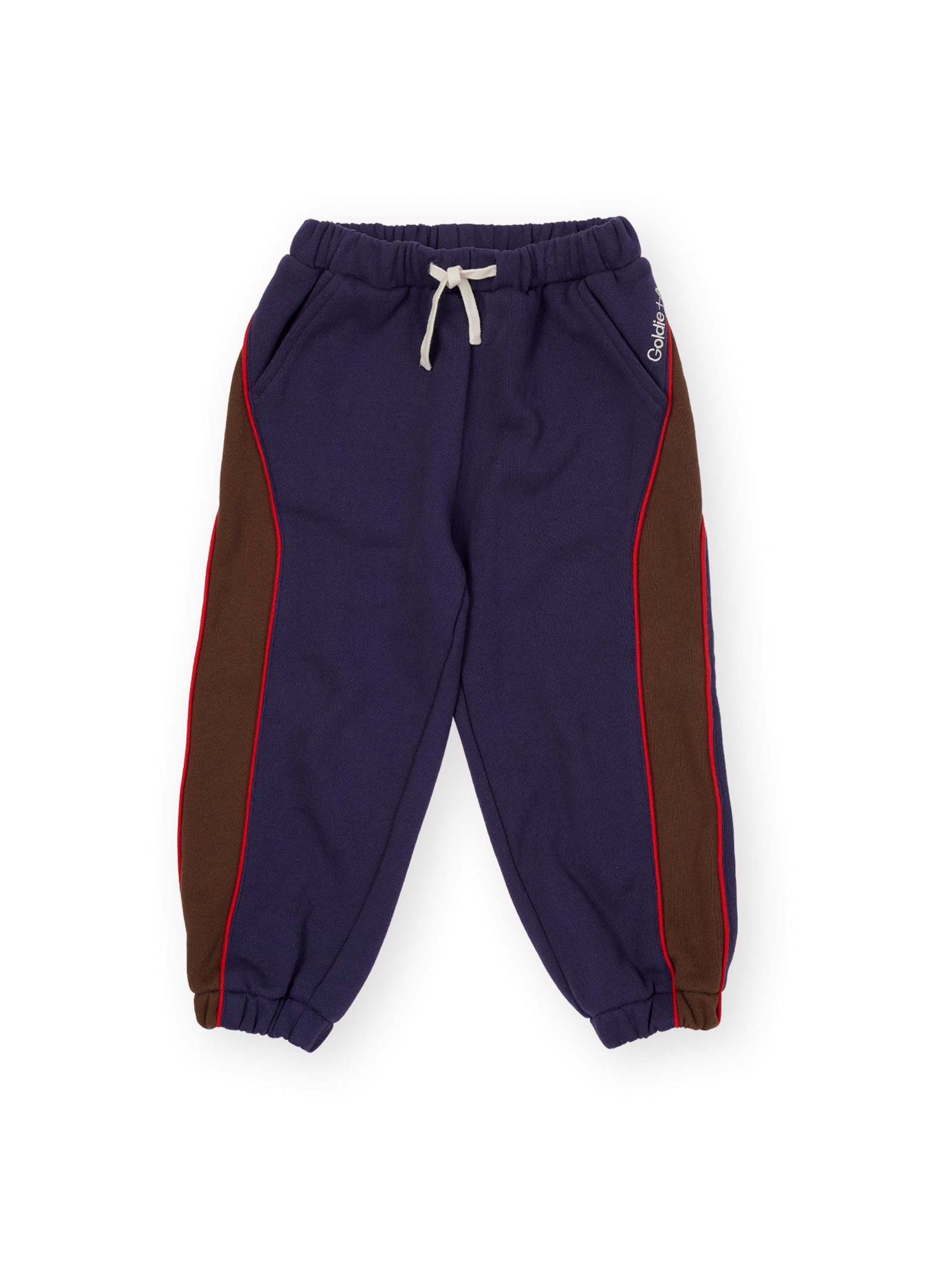 The Goldie + Ace Zig Zag Sweat Pant in Navy & Brown pictured on a transparent background. The material is 100% cotton. It is a sweatpant made for babies, toddlers and kids.