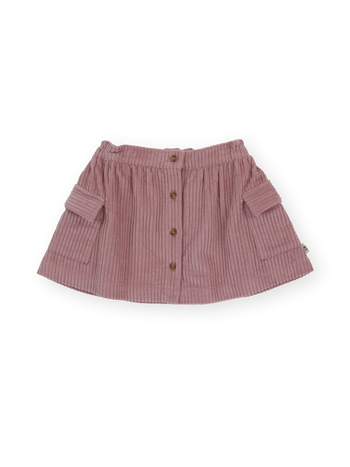 The Goldie + Ace Corduroy Pocket Skirt in Dusty Pink pictured on a transparent background. The material is 100% cotton. It is a skirt made for babies, toddlers and kids.