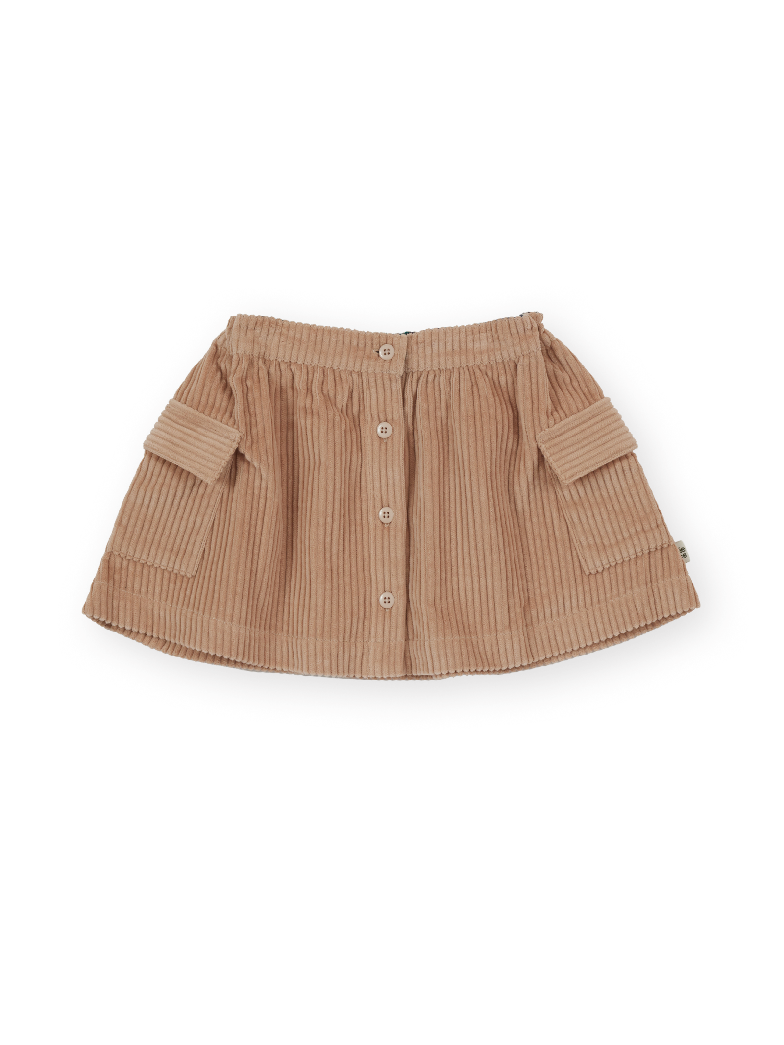 The Goldie + Ace Corduroy Pocket Skirt in Tan pictured on a transparent background. The material is 100% cotton. It is a skirt made for babies, toddlers and kids.