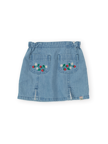 The Goldie + Ace Wild Strawberry Chambray Skirt in Vintage Blue pictured on a transparent background. The material is 100% cotton. It is a skirt made for babies, toddlers and kids.