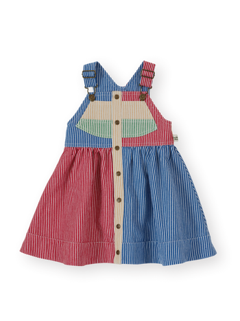 The Goldie + Ace Patchwork Stripe Heidi Pinafore Dress in Primary pictured on a transparent background. The material is 55% polyester 45% cotton. It is a dress made for babies, toddlers and kids.