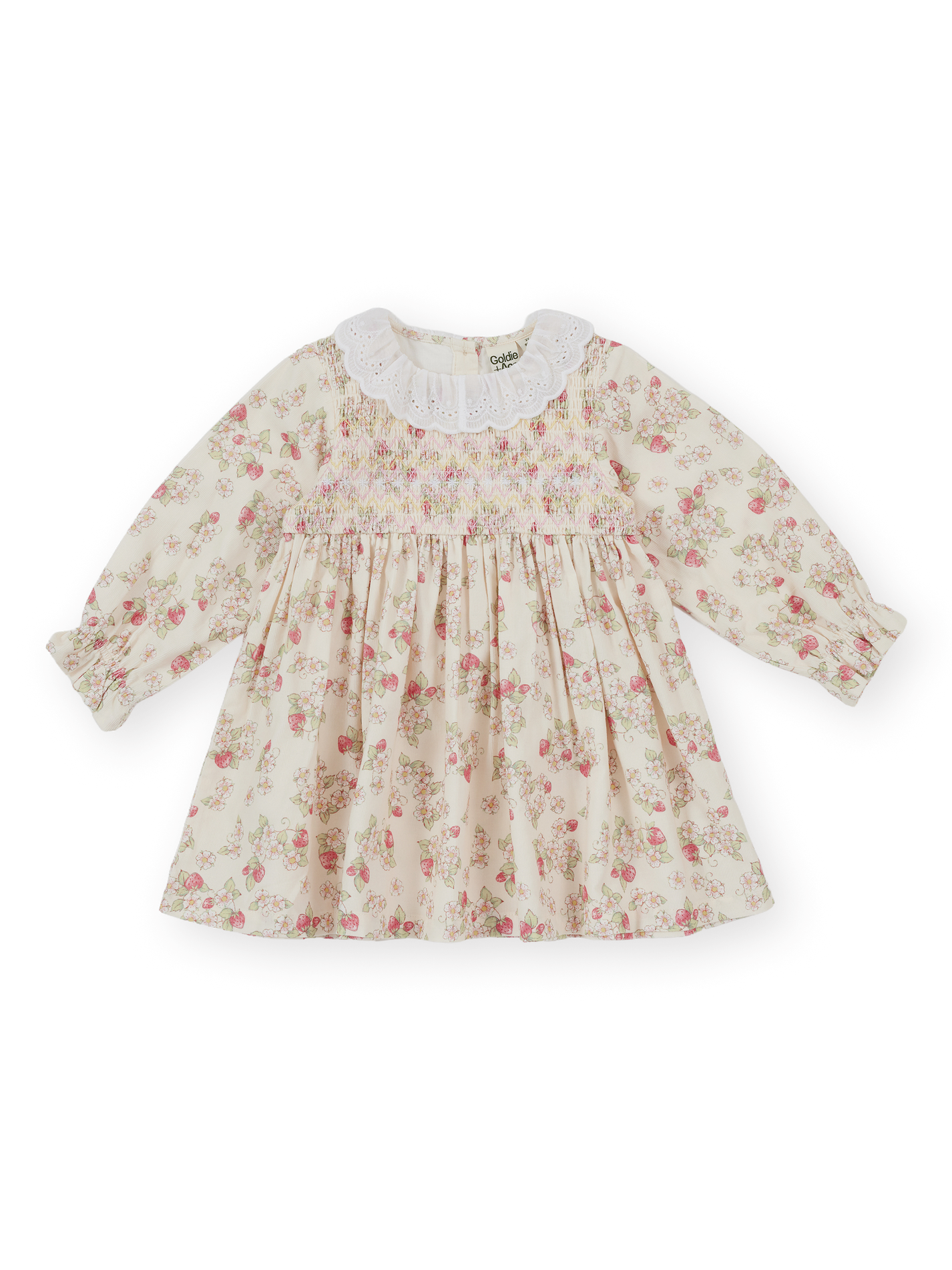 The Goldie + Ace Strawberry Fields Smocked Dress in Cream pictured on a transparent background. The material is 100% cotton. It is a dress made for babies, toddlers and kids.