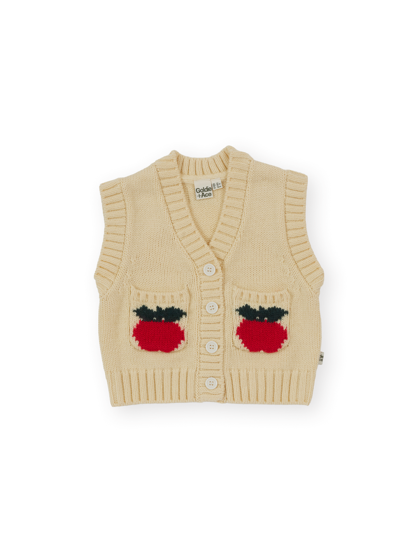 The Goldie + Ace Apple Pocket Knit Vest in Cream pictured on a transparent background. The material is 15%wool 15%nylon 70%acrylic. It is a knit made for babies, toddlers and kids.