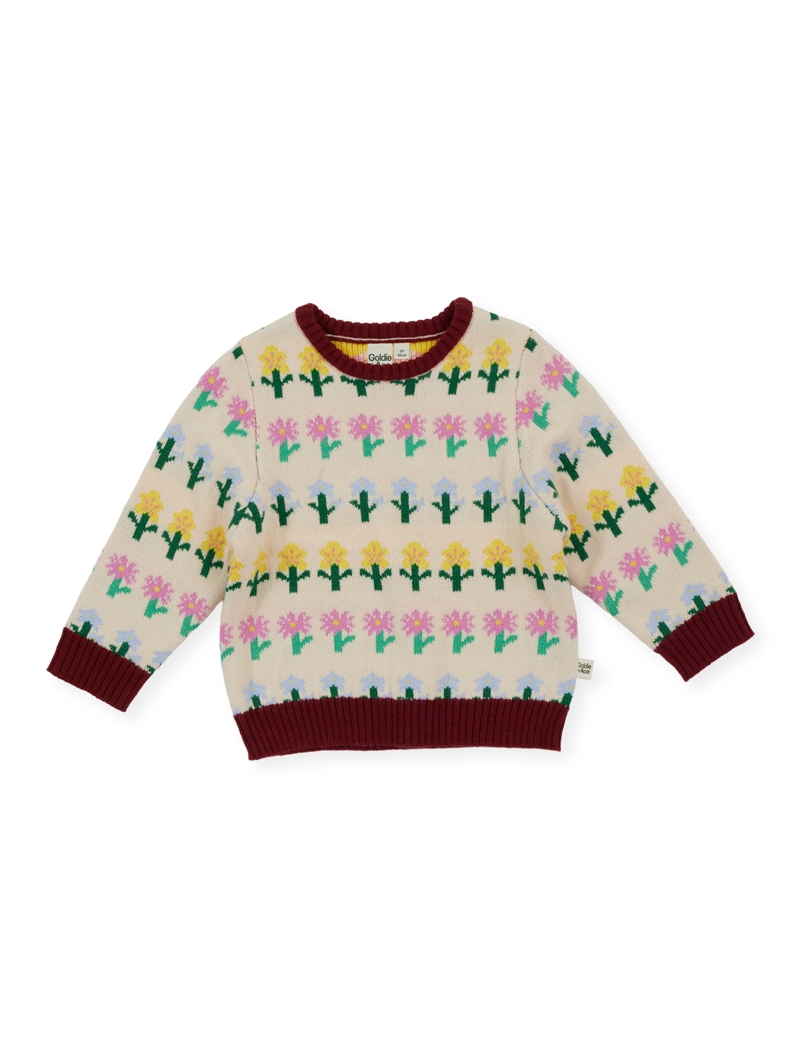 The Goldie + Ace Flower Garden Knit Jumper in Cream pictured on a transparent background. The material is 15% wool, 47% acrylic, 43% nylon. It is a knit made for babies, toddlers and kids.