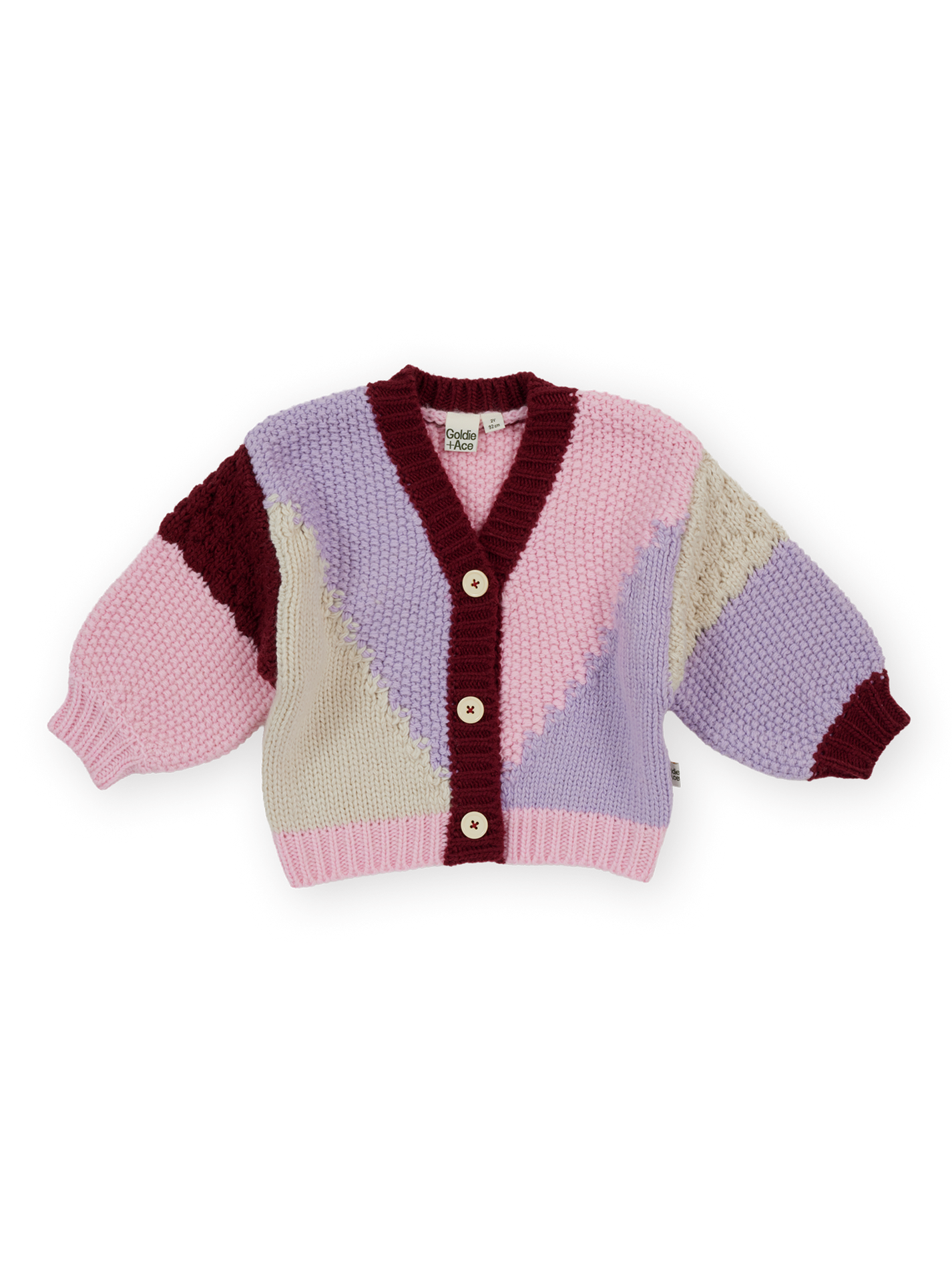 The Goldie + Ace Colour Block Knit Cardigan in Pink &amp; Purple pictured on a transparent background. The material is 80% acrylic 20% wool. It is a knit made for babies, toddlers and kids.