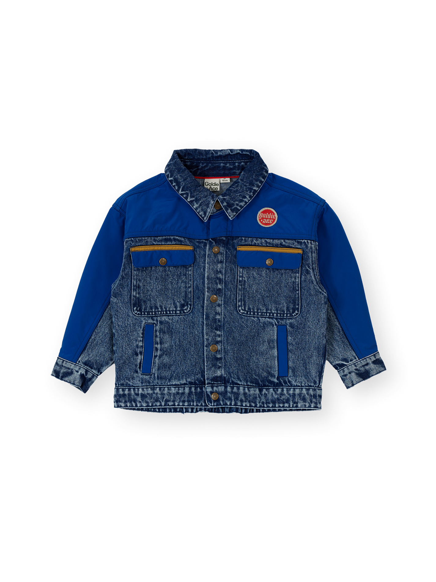 The Goldie + Ace Colour Block Vintage Denim Jacket in Dark Denim &amp; Multi pictured on a transparent background. The material is 100% cotton, 100% polyester coloured panels, 100% cotton lining. It is a jacket made for babies, toddlers and kids.