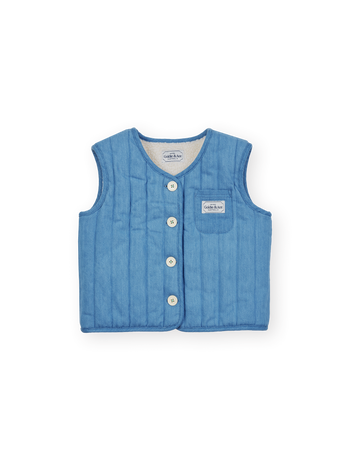 The Goldie + Ace Reversible Chambray Button Vest in Natural & Vintage Blue pictured on a transparent background. The material is 100% cotton, 100% polyester reverse side. It is a vest made for babies, toddlers and kids.