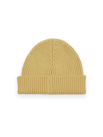 The Goldie + Ace Wool Beanie in Yellow pictured on a transparent background. The material is 100% merino wool. It is a hat made for babies, toddlers and kids.