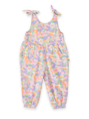 The Goldie + Ace Pastel Bouquet Tiffany Tie Overalls in Lilac Multi pictured on a transparent background. The material is 100% cotton. It is a overall made for babies, toddlers and kids.
