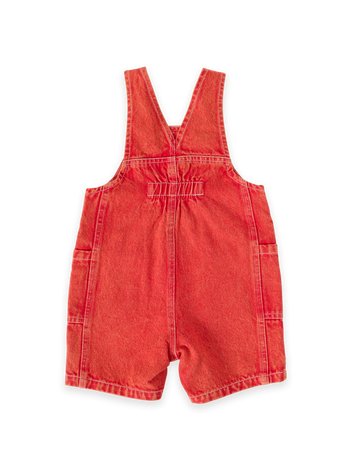 The Goldie + Ace James Vintage Washed Denim Pocket Overalls in Apple Red pictured on a transparent background. The material is 100% cotton. It is a overall made for babies, toddlers and kids.