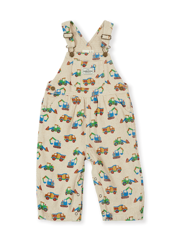 The Goldie + Ace Diggers Austin Overalls in Sand pictured on a transparent background. The material is durable & soft cotton-linen blend. It is a overall made for babies, toddlers and kids.