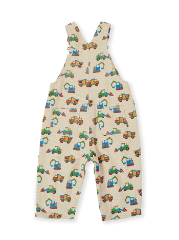 The Goldie + Ace Diggers Austin Overalls in Sand pictured on a transparent background. The material is durable & soft cotton-linen blend. It is a overall made for babies, toddlers and kids.