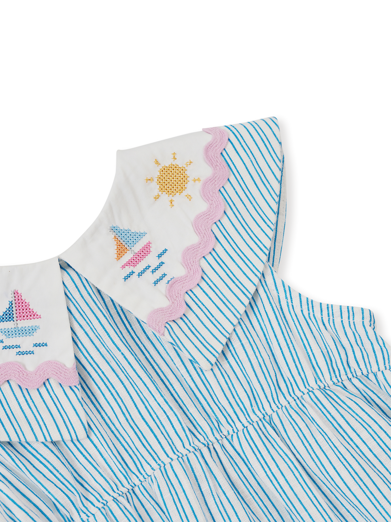 The Goldie + Ace Sailor Stripe Ava Collared Romper in Ocean/Ivory pictured on a transparent background. The material is soft and breathable rayon-linen blend. It is a romper made for babies, toddlers and kids.
